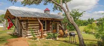 swiss log cabins in fredericksburg texas