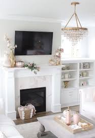 modern mantel decor with a tv 7 ways