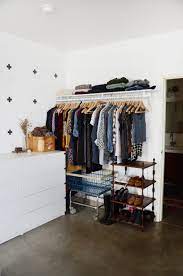 organize a bedroom with no closets