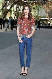 She is the daughter of british music icon . Great Outfits In Fashion History Lily Collins Pairs Her Embellished Chanel With Denim Fashionista