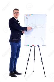 Successful Business Man With A Flip Chart In A Presentation