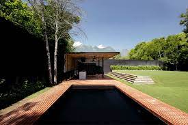 Enigmatic Black Pool With Red Brick