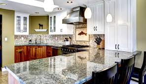 Although you may love the look of blue pearl granite, you might want to break up the monotony with a butcher block countertop on the island. Granite Colors For Countertops Pictures Of Popular Types Designing Idea