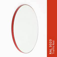 small silver orbis wall mirror with red