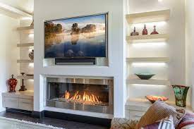 install a tv over a fireplace