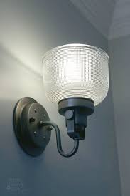How to light sconces without using electricity using rechargeable puck lights. How To Install A Wall Sconce Light Fixture