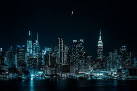 Magnificent beautiful dramatic aerial of the brooklyn bridge at night in new york city. New York City 4k Wallpaper Cityscape Night City Lights Half Moon 5k World 437