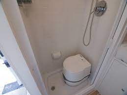 Camper shower toilet combo unit. Building A Wet Bath And Shower Into Promaster Diy Camper Van