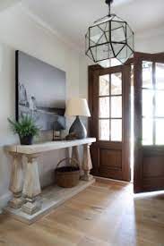 75 light wood floor entryway with a