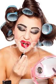 bad makeup applying lip gloss stock