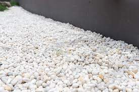 Colors range from white to tan to brown. How To Landscape With Stones Stone Landscaping Improvenet