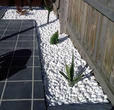 Garden Landscaping With White Pebble