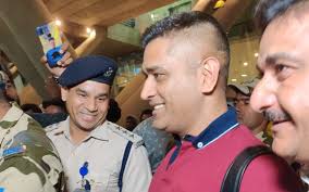 ms dhoni flaunts his new hairstyle