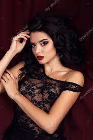 woman with dark hair and evening makeup