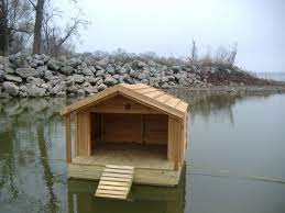 The floor and all sides are made of 7/16 osb, and the wall studs are of 2x2 pine, untreated. Custom Ac Heated Insulated Dog House Custom Floating Duck Houses Duck House Plans Floating Duck House Goose House
