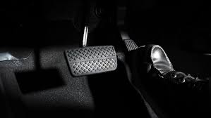 Premium Photo | Accelerate and brake. foot pressing foot pedal of a car to  drive ahead. accelerator and brake pedal in a car. driver driving the car  by pushing accelerator pedals of
