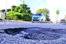 Image result for images for potholes in Barbados