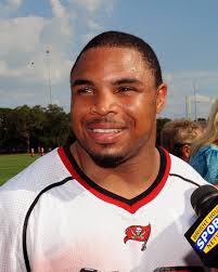 Running back Doug Martin #22 of the Tampa Bay Buccaneers talks to the media after a rookie practice at the Buccaneers practice facility May 4, ... - Doug%2BMartin%2BTampa%2BBay%2BBuccaneers%2BMinicamp%2BAvoto2eFedgl