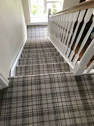 grey tartan carpet ed to stairs and