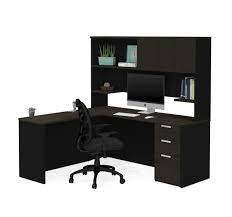 A solid wooden desk with a hutch provides durability and comes in a variety of styles, from classic dark woods to light, natural oak. Pro Concept Plus L Shaped Desk With Pedestal And Hutch Bestar
