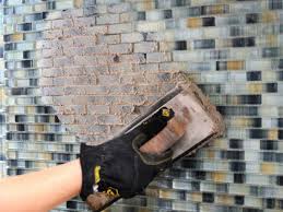Place the mosaic sheets or tiles along the wall. How To Install A Tile Backsplash How Tos Diy