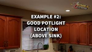 install pot lights above kitchen sink