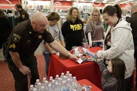 Many of the gifts are designed from input by pta & pto. Macon County Kids Go Christmas Shopping With Members Of Sheriff S Office Local Herald Review Com
