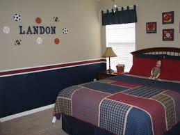 A platform bed is the sole piece of furniture. Big Boy Sports Room Boys Bedroom Paint Big Boy Room Boys Room Design