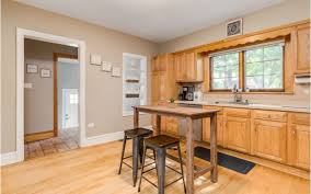Light Maple Cabinets With White Countertops