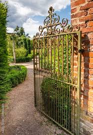 Rusty Wrought Iron Gate Opening Into
