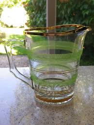 A 1950s Era Pressed Glass Water Jug Or