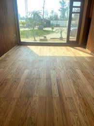 brown red oak wooden flooring surface