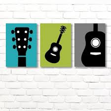 Treble clef wall sign, music theme wall decor, kids name sign, wood name sign, kids room decor, personalized name sign, music room art labelsrus 5 out of 5 stars (10,643) $ 19.95. Boy Guitar Wall Art Rock And Roll Music Theme Guitar Nursery Etsy Guitar Wall Art Music Canvas Music Themed Bedroom