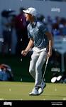 Will Zalatoris celebrates after making a putt on the 18th green ...