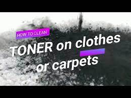 spilled toner on carpets and clothes