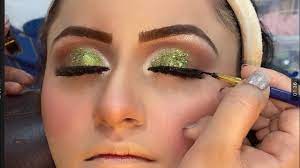 walima makeup look with green dress