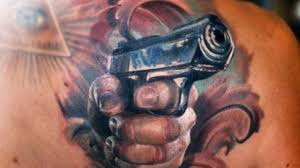Here is the link for the tattoo: 33 Great Gun Tattoos With Meanings And Celebrities Body Art Guru