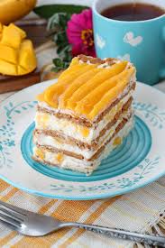 · mango chiffon cake is a soft and light chiffon cake frosted with mango swiss meringue buttercream and filled with sweet sliced mangoes. Mango Float Easy Recipe Foxy Folksy