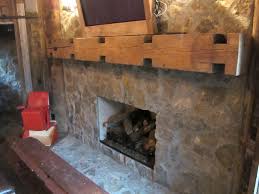 Stone Fireplace With Reclaimed Wood