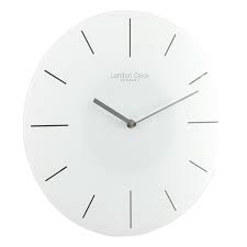 contemporary wall clock in white glass