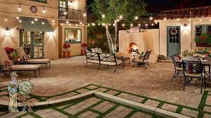 Spanish Style Backyard Fireplace With