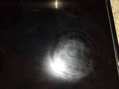 help brand new glass cooktop is ruined