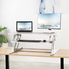 Standing desks can be fixed height, although these are rarely recommended because standing all day is just as bad. Symple Stuff Fitts Adjustable Standing Desk Converter Reviews Wayfair