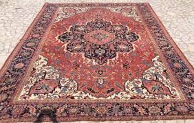 antique heriz carpet with medallion