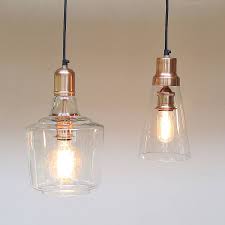 Stylish Glass Pendant Lights With Copper Details And Rose