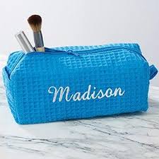 las embroidered aqua makeup bag