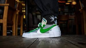 The blazer mid is a timeless sneaker worn by thousands of people. An On Foot Look At The Sacai X Nike Blazer Low Classic Green Magma Orange The Sole Supplier