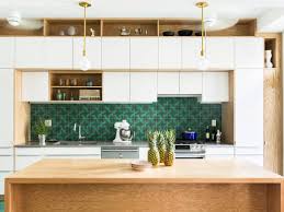 This kitchen might be small, but it makes a big statement. Colorful And Modern Kitchen Backsplash Ideas