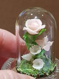 Buy Glass Capsule Decorated With A Rose