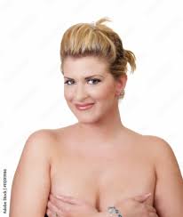 Young large blond woman covering bare breasts Stock Photo | Adobe Stock